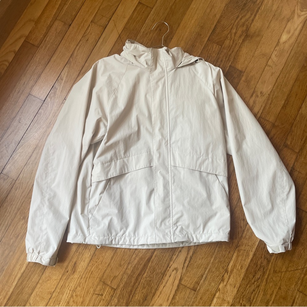 Uniqlo men’s size small cream/beige rain jacket